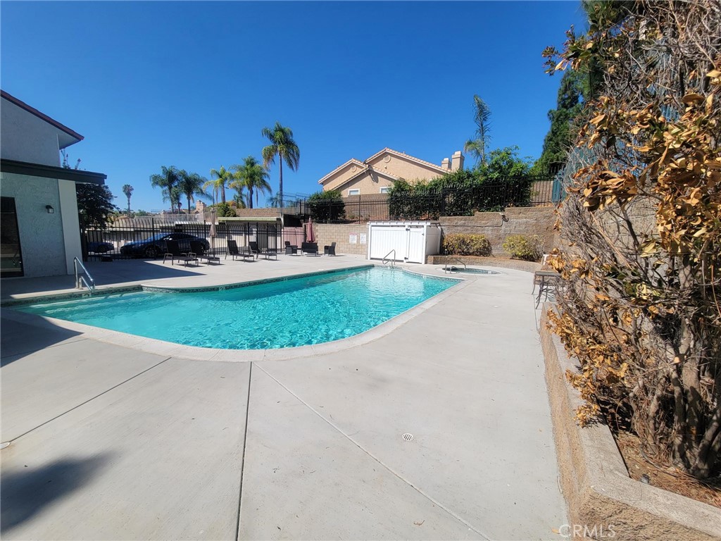 a view of a house with a swimming pool