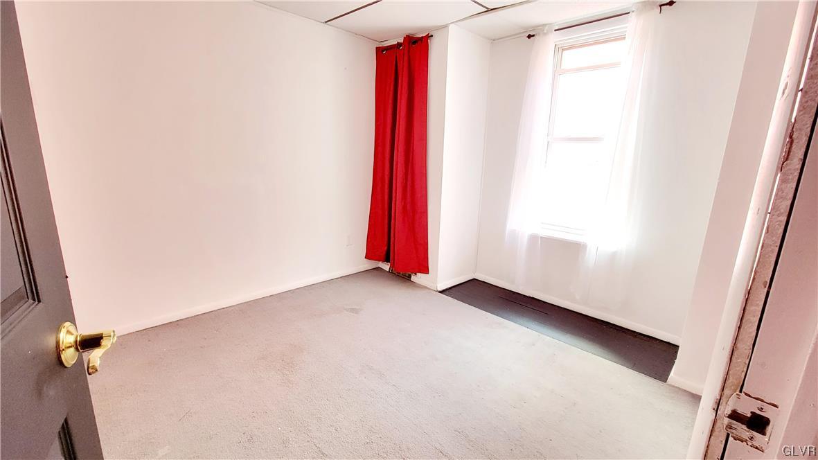 1512 East 7th Street Bethlehem, PA 18015 - Photo 12 of 15 a view of a room with red walls and a window