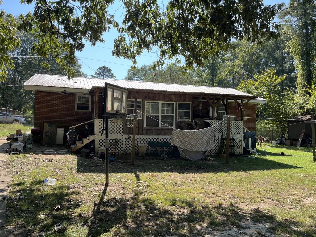 25 Wynnie Road Rome, GA 30165 - Photo 3 of 10 a view of a house with backyard porch and sitting area