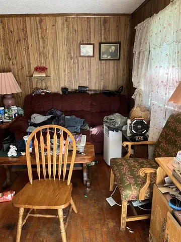 a view of a chairs and table in a room