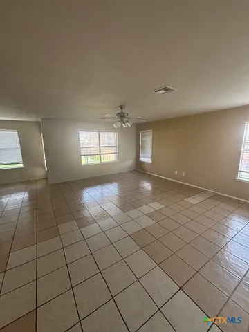 a room with furniture and a chandelier