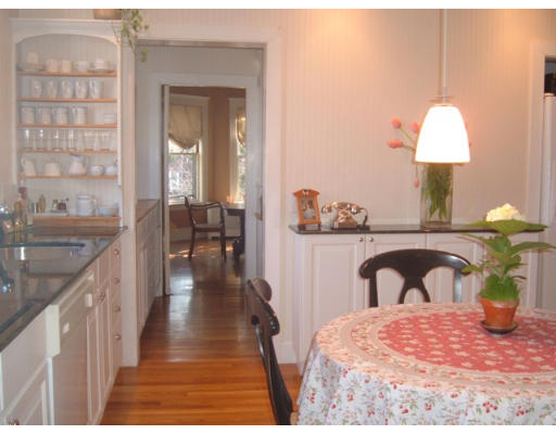 233 Clinton Road Brookline, MA 02445 - Photo 5 of 6 a bathroom with a sink and a mirror