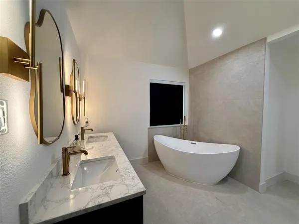 a view of a living room and bathroom