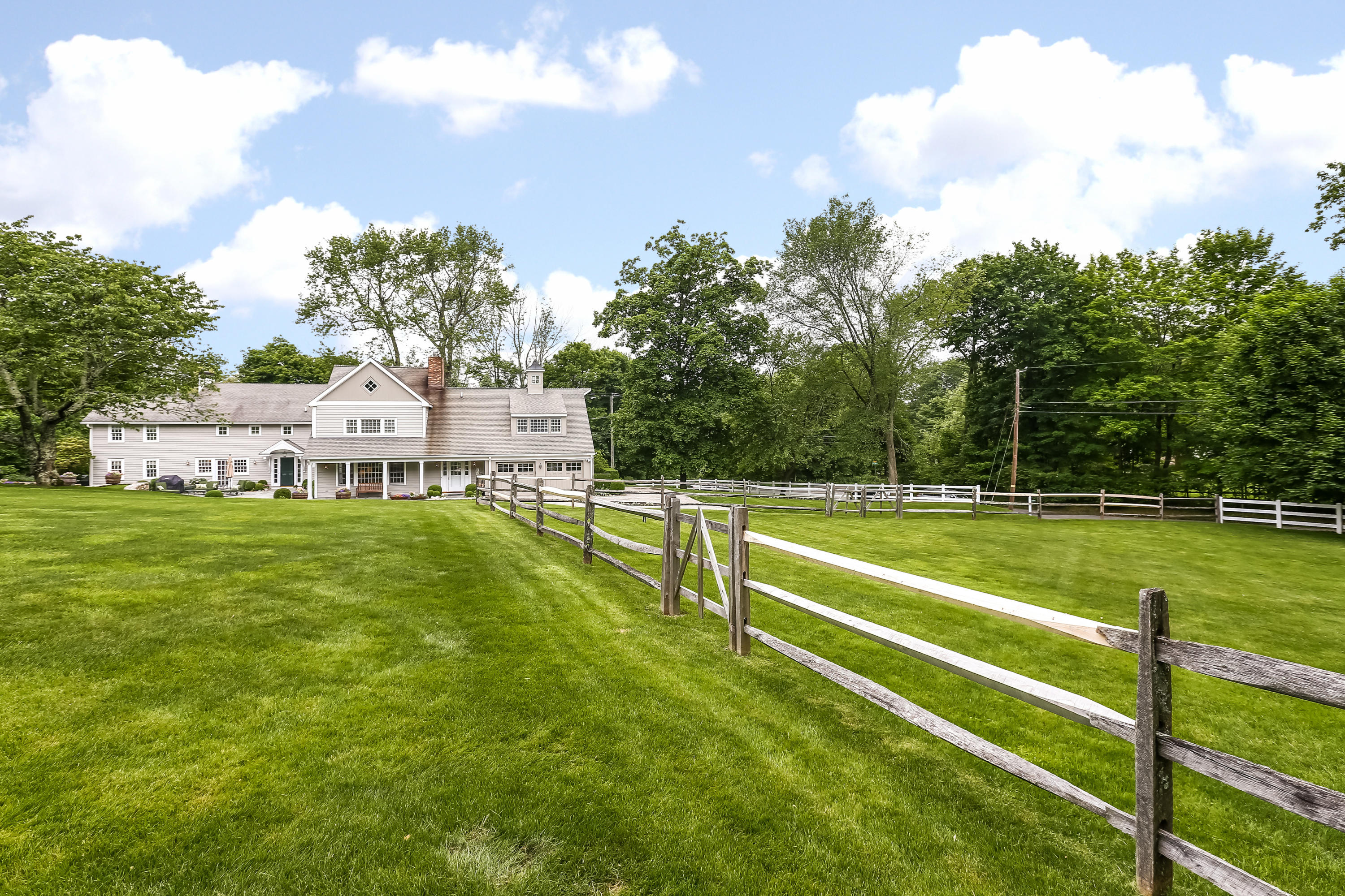 2 Saddle Ridge Road Darien, CT 06820 - Photo 2 of 33 a view of house with outdoor space and sitting area