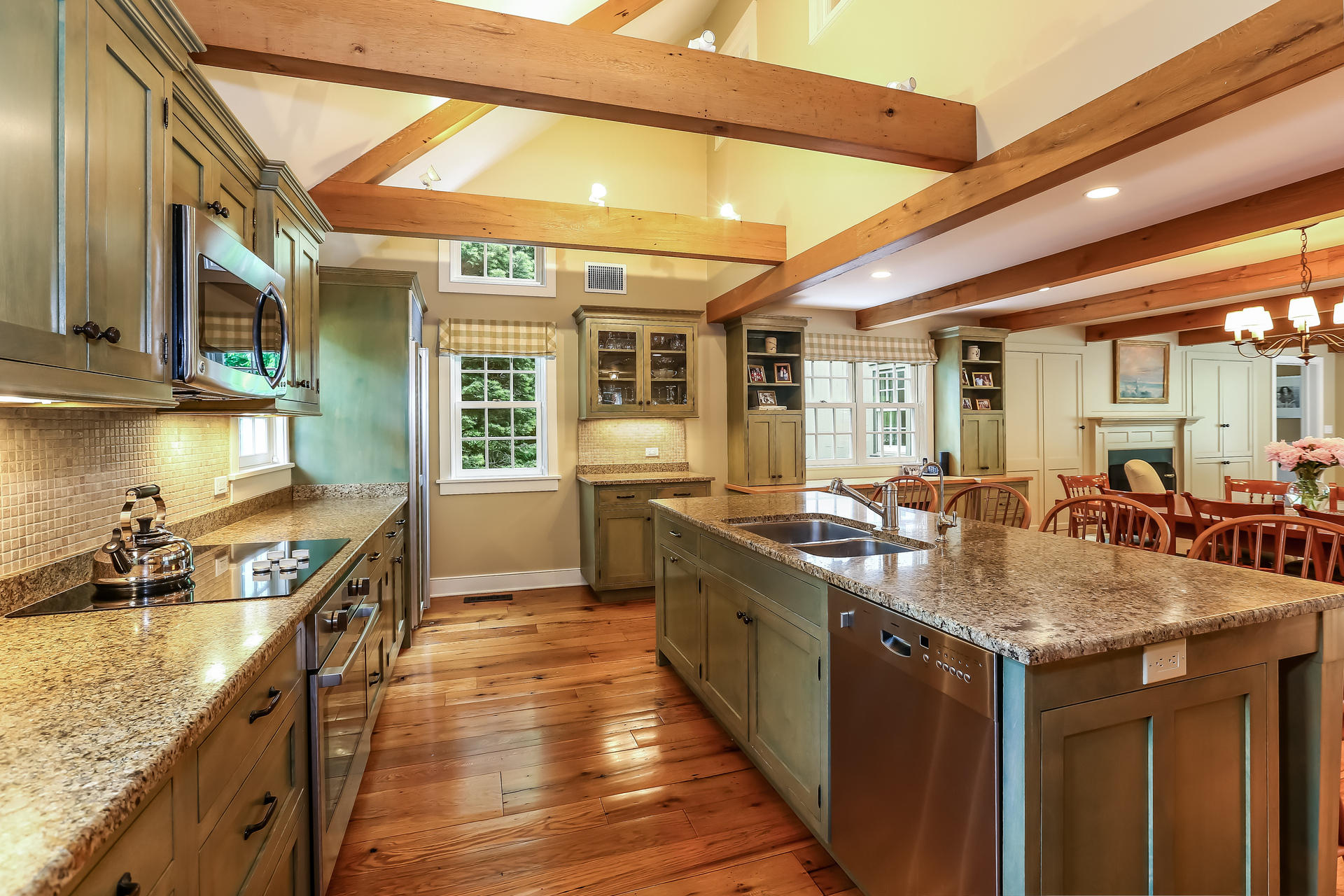 2 Saddle Ridge Road Darien, CT 06820 - Photo 11 of 33 a kitchen with stainless steel appliances granite countertop a sink and a large window
