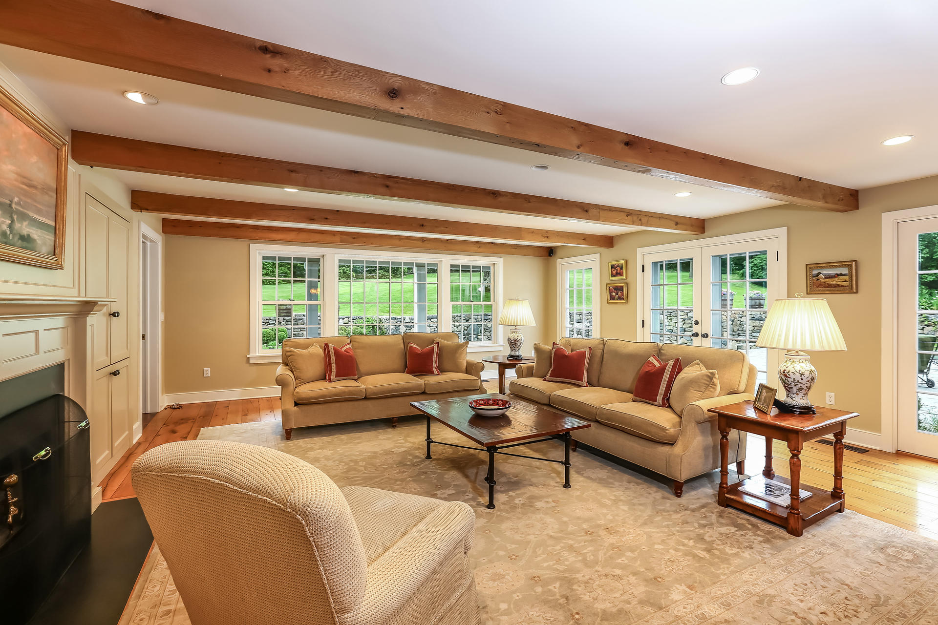 2 Saddle Ridge Road Darien, CT 06820 - Photo 13 of 33 a living room with furniture and a fireplace