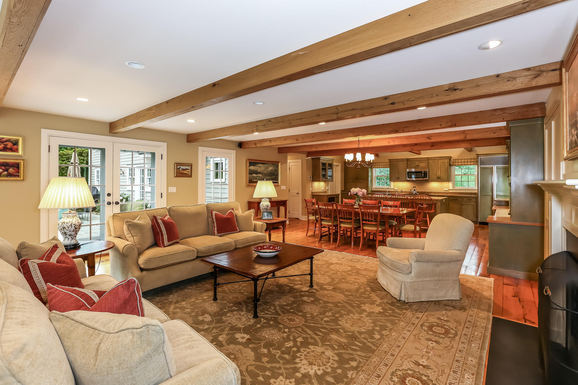 2 Saddle Ridge Road Darien, CT 06820 - Photo 14 of 33 a living room with lots of furniture and a lamp