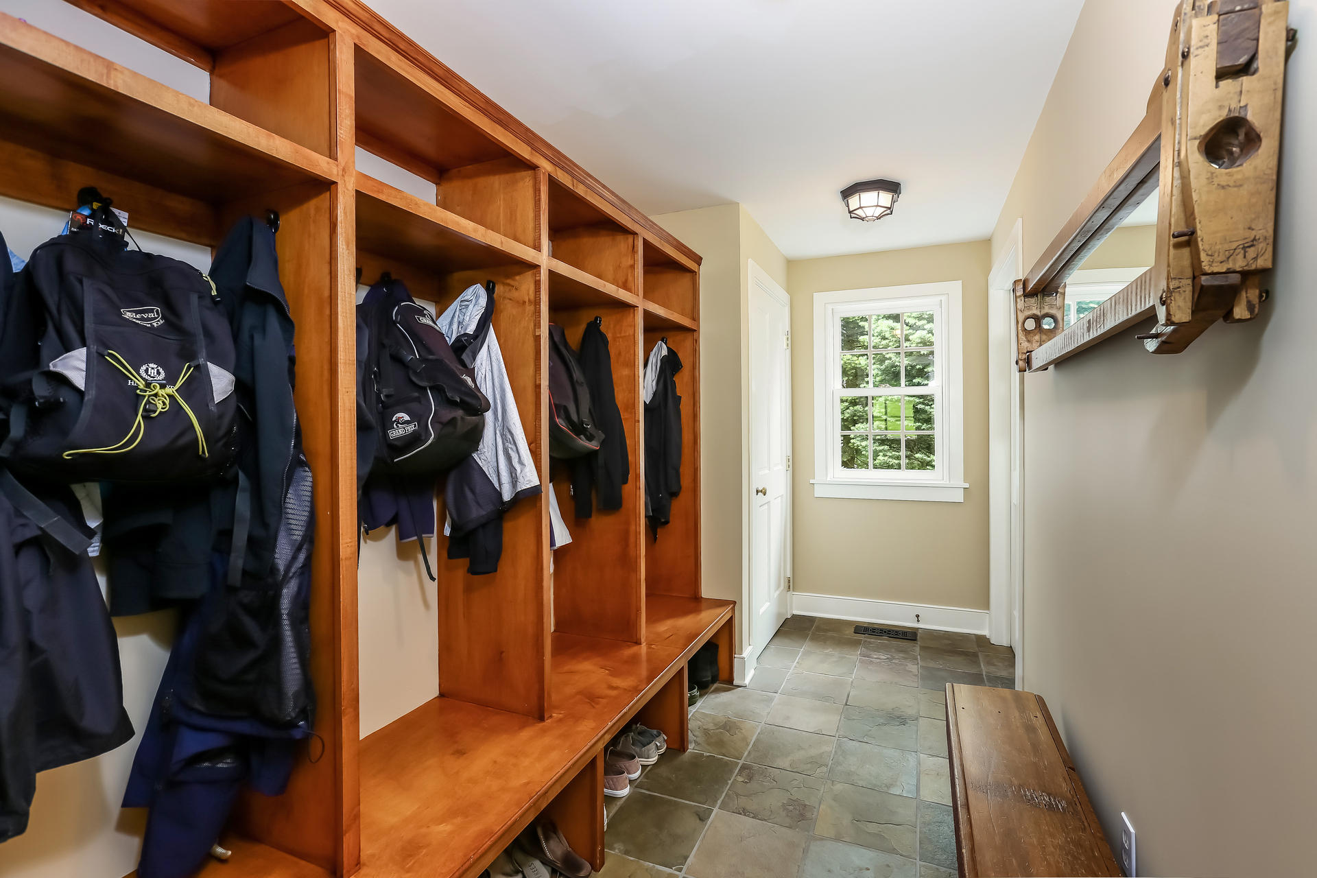 2 Saddle Ridge Road Darien, CT 06820 - Photo 17 of 33 a view of walk in closet with clothes and shoes