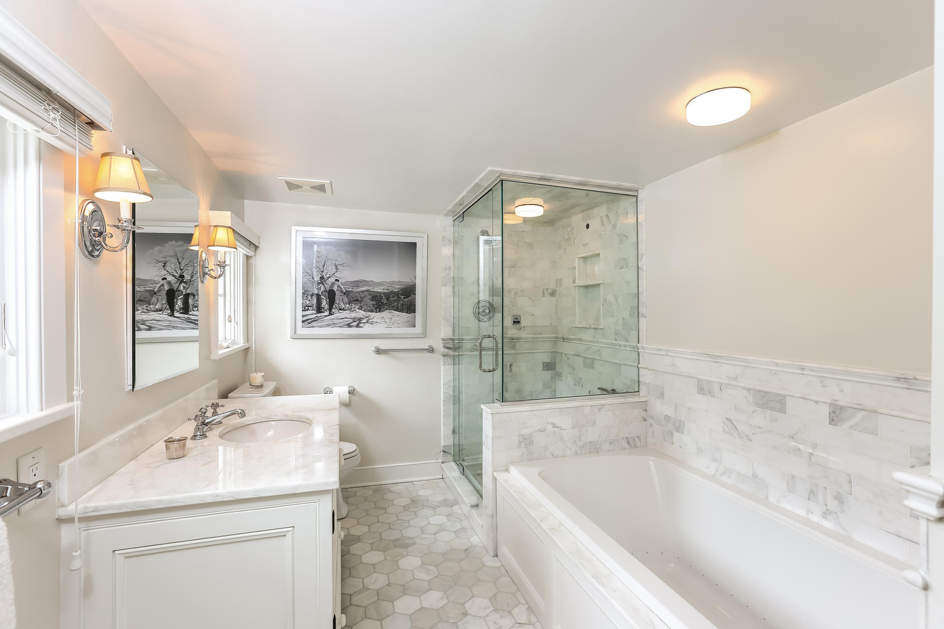 2 Saddle Ridge Road Darien, CT 06820 - Photo 19 of 33 a bathroom with a bathtub shower sink vanity and toilet