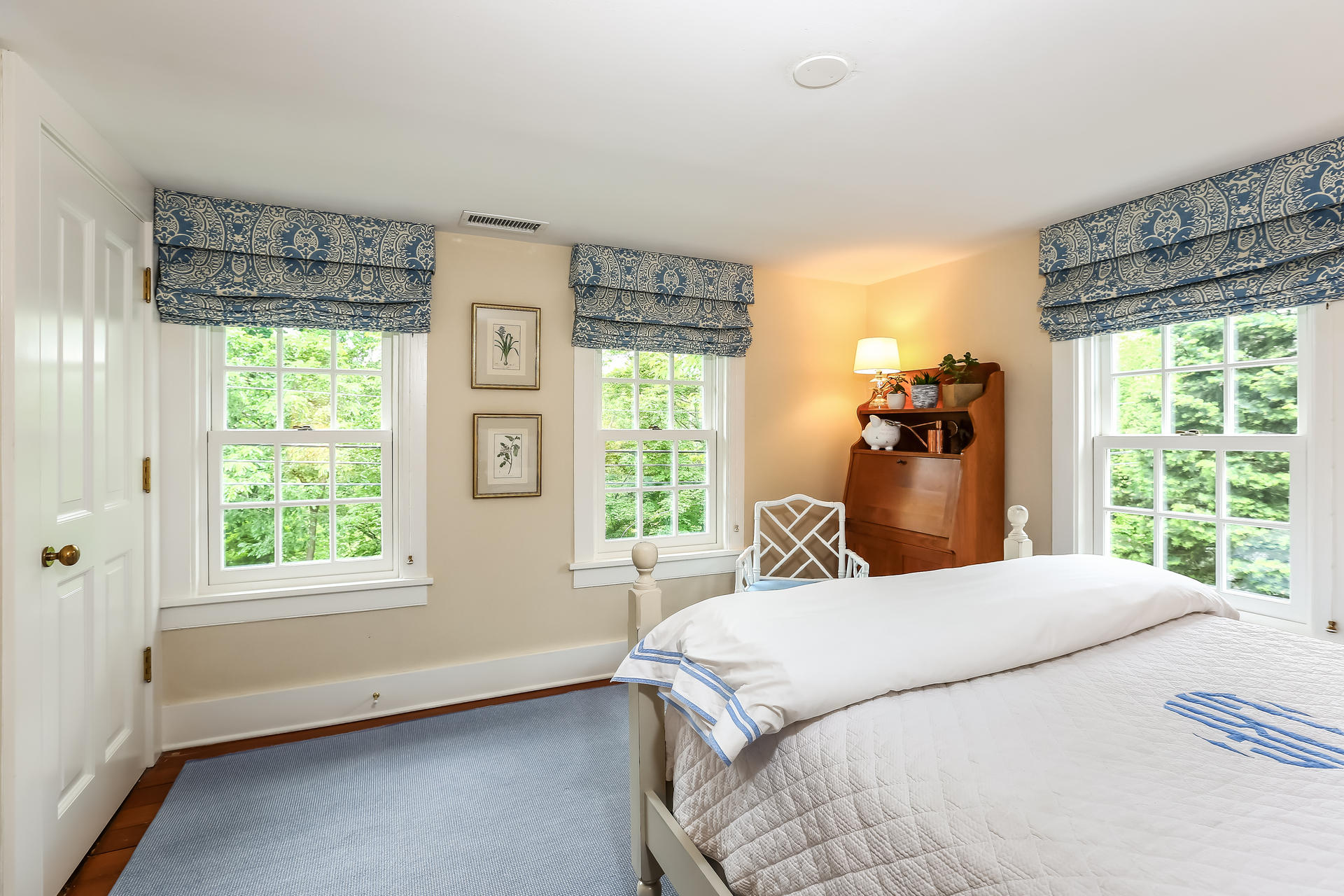 2 Saddle Ridge Road Darien, CT 06820 - Photo 21 of 33 a bedroom with a bed and a large window