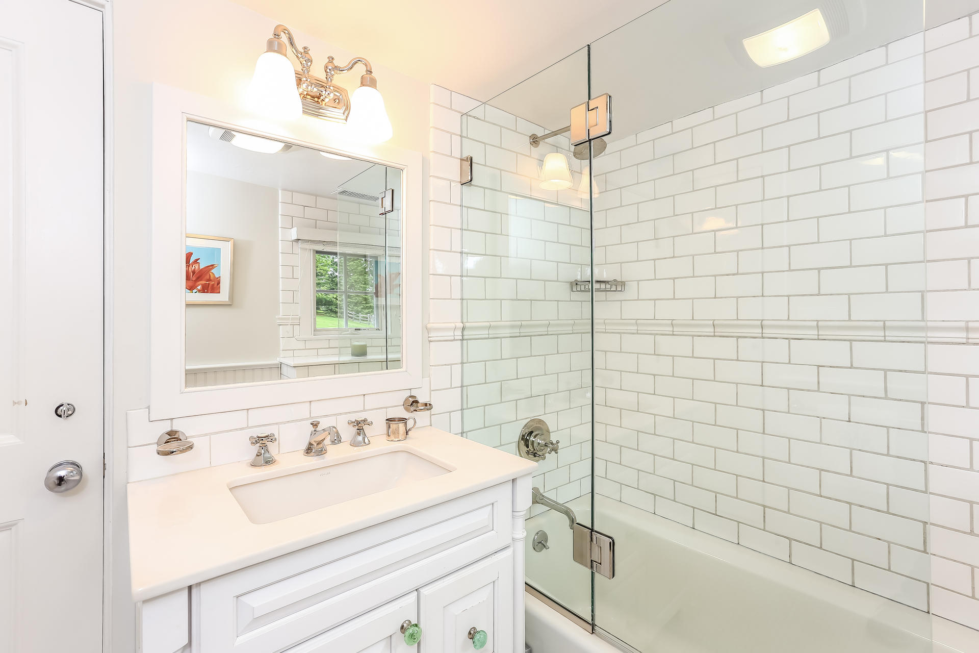 2 Saddle Ridge Road Darien, CT 06820 - Photo 24 of 33 a bathroom with a sink and a shower