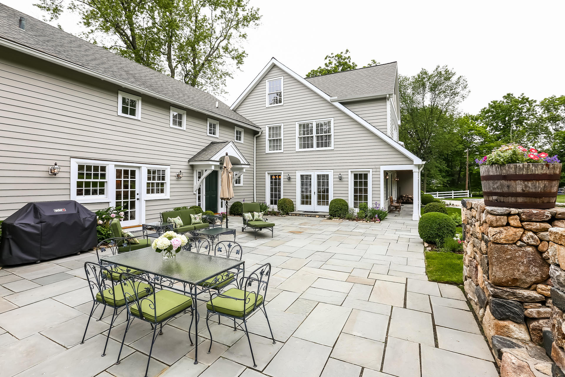 2 Saddle Ridge Road Darien, CT 06820 - Photo 7 of 33 a view of a house with patio