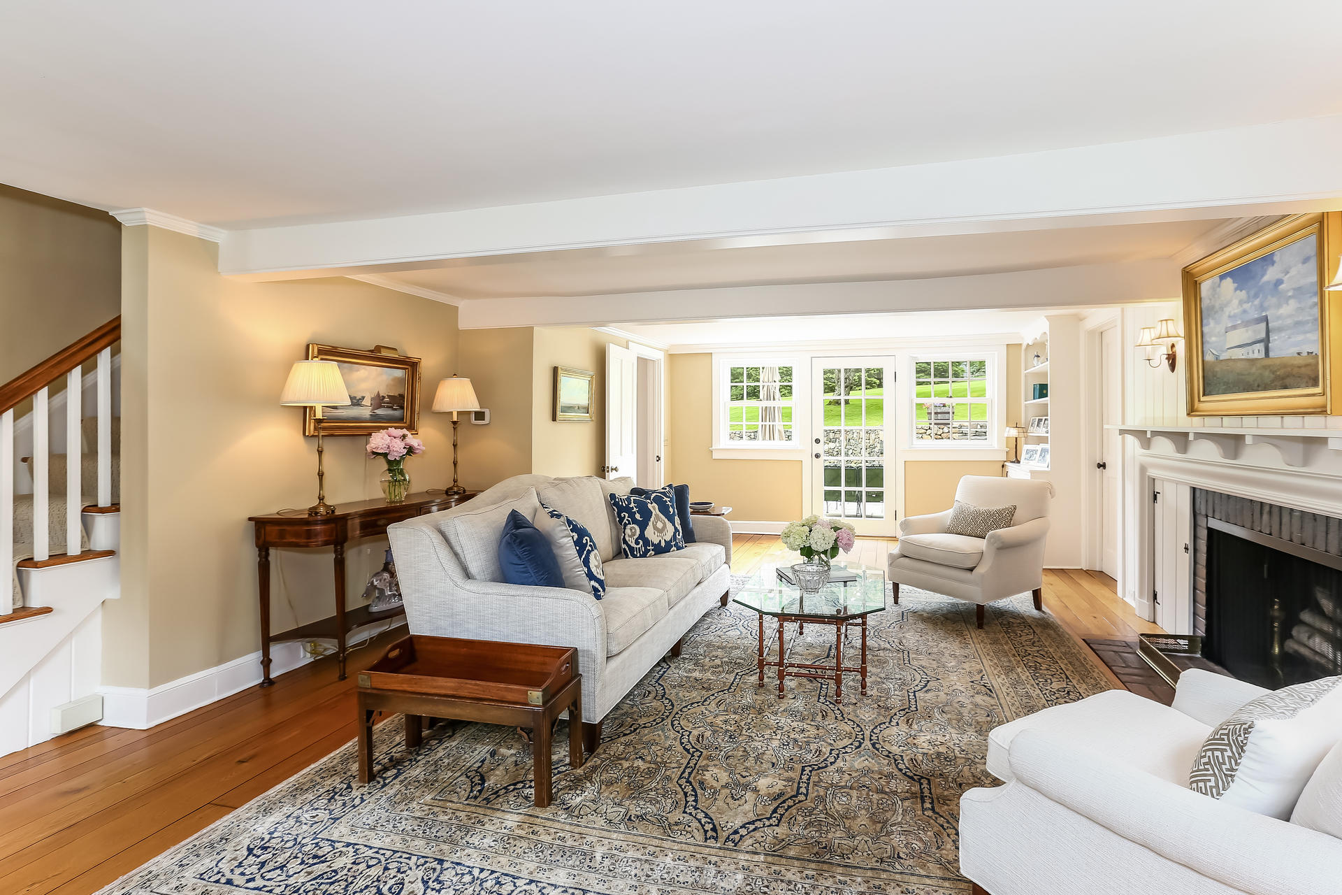 2 Saddle Ridge Road Darien, CT 06820 - Photo 9 of 33 a living room with furniture fireplace and a table