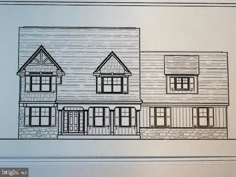 a view of a brick house that has windows