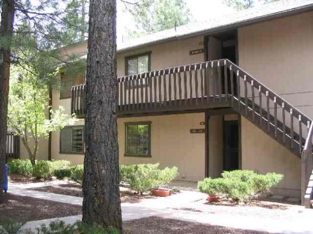 2705 Sports Village Loop Pinetop, AZ 85935 - Photo 1 of 5 a front view of a house with a yard