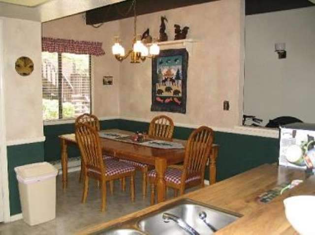 2705 Sports Village Loop Pinetop, AZ 85935 - Photo 3 of 5 a dining room with furniture and window