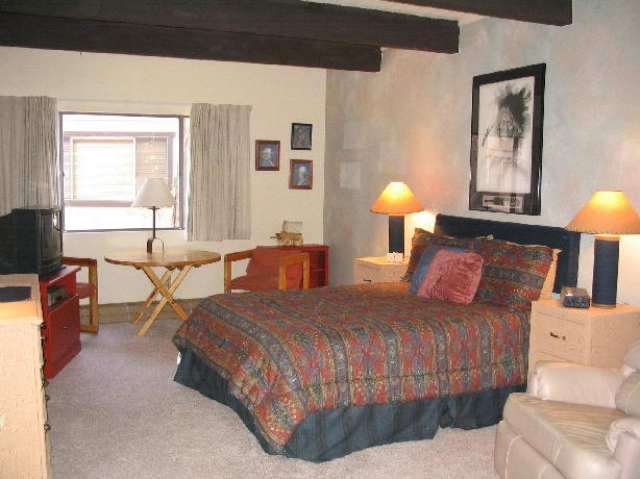 2705 Sports Village Loop Pinetop, AZ 85935 - Photo 5 of 5 a bedroom with a bed and window