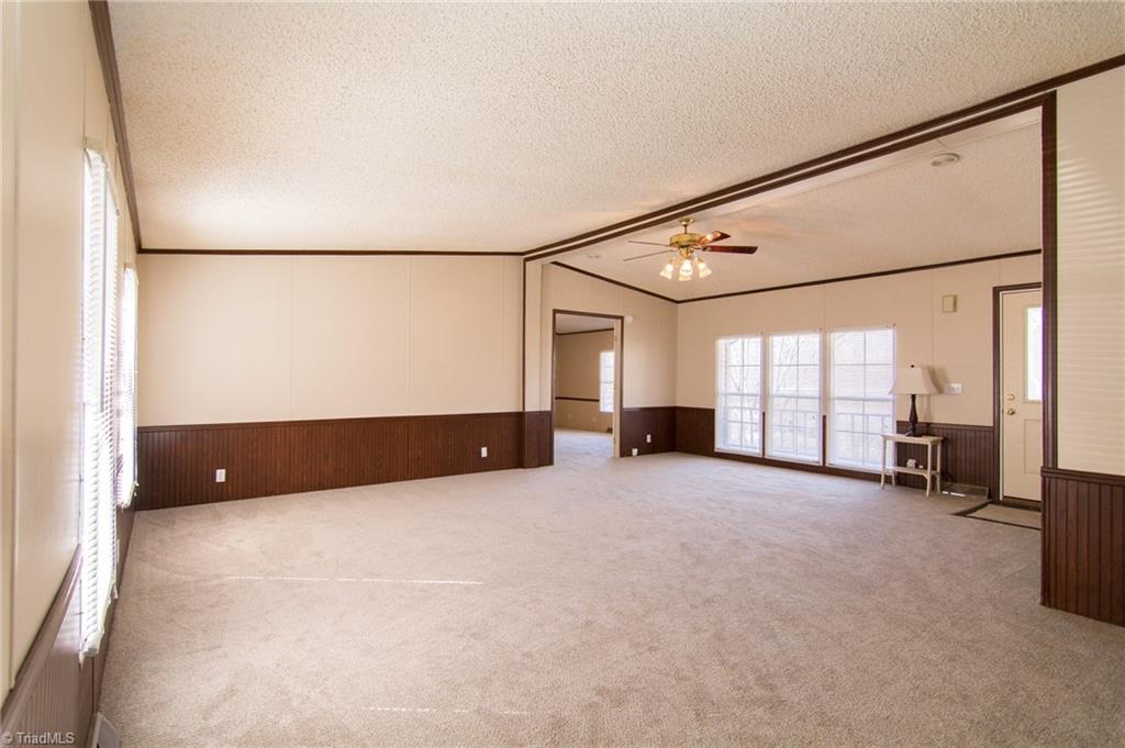 4819 Poplar Ridge Road Trinity, NC 27370 - Photo 10 of 22 Dining area looking into oversized living room.
