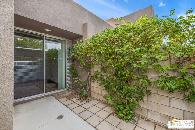 an empty room with a ceiling fan