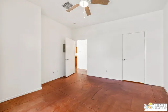 a view of small space with racks on the wall