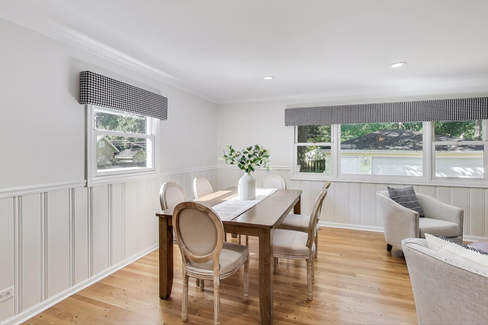 924 Lyford Lane Wheaton, IL 60189 - Photo 14 of 43 a view of a dining room with furniture window and outside view