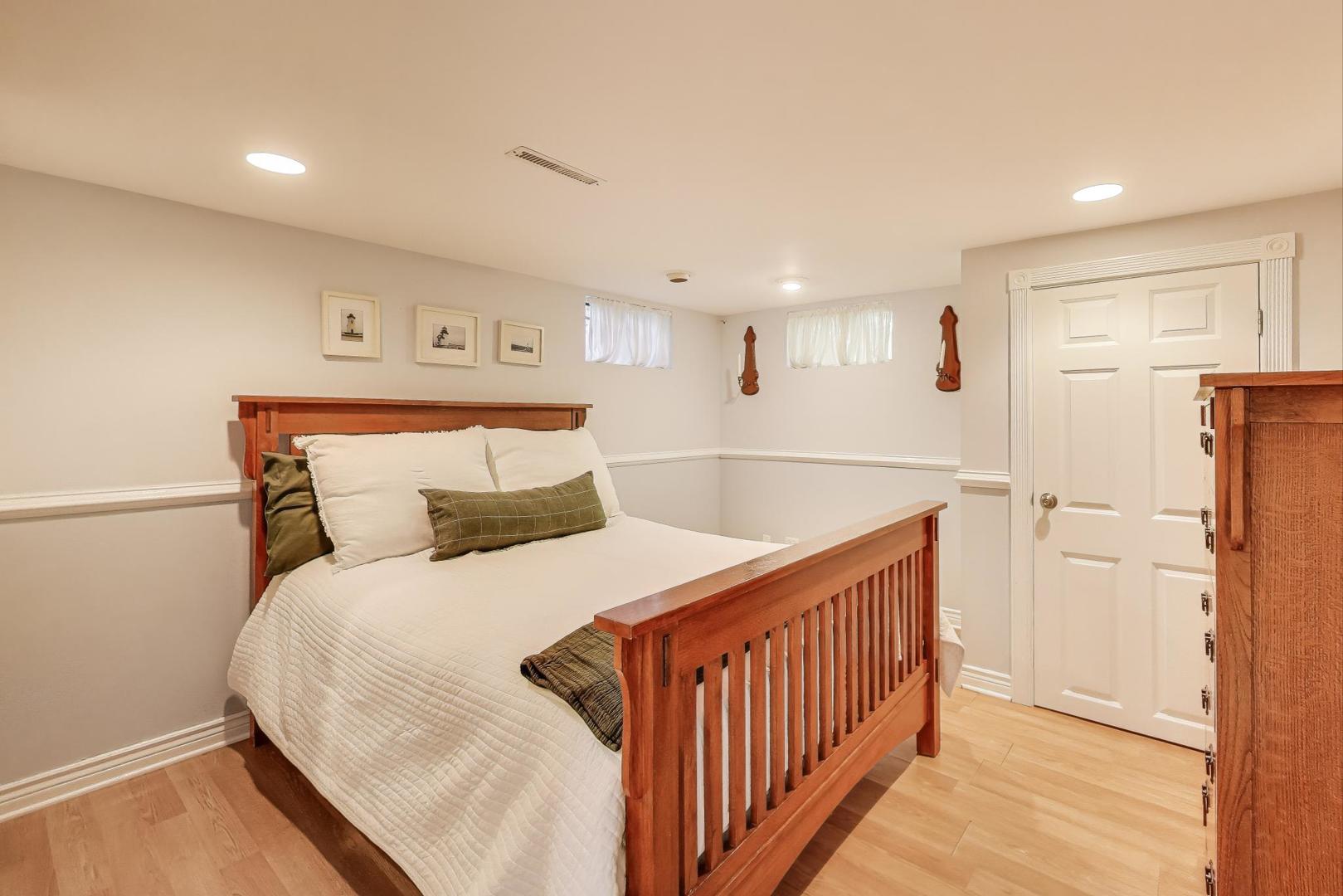 924 Lyford Lane Wheaton, IL 60189 - Photo 27 of 43 a bedroom with bed and a refrigerator