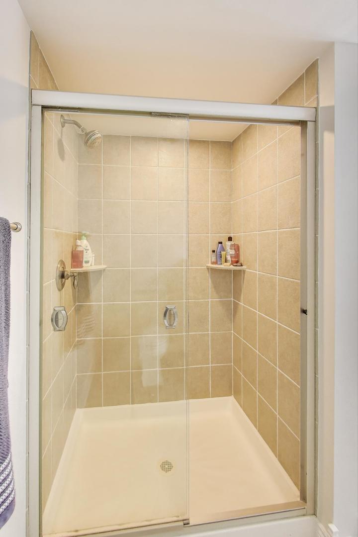 924 Lyford Lane Wheaton, IL 60189 - Photo 30 of 43 a bathroom with a shower and a shower