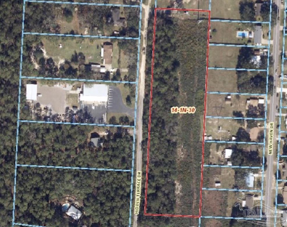 Hidden Terrace Drive Cantonment, FL 32533 - Photo 4 of 4 a view of a glass window with a wooden floor