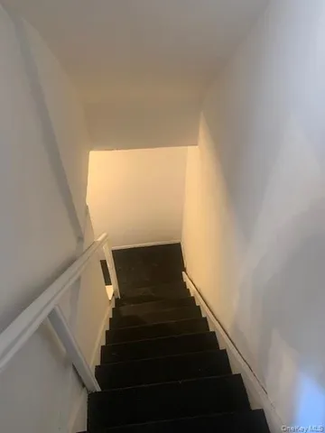 a view of a backyard of a house