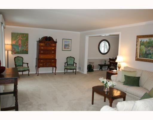 514 Trotwood Ridge Road Upper St. Clair, PA 15241 - Photo 2 of 18 Living Room. Quiet elegance...Spacious room with neutral decor, newer carpeting, crown molding...Open to the dining room for easy entertaining!