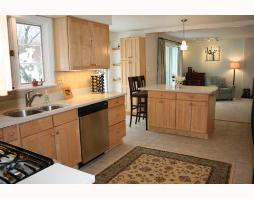 514 Trotwood Ridge Road Upper St. Clair, PA 15241 - Photo 4 of 18 Kitchen. Updated kitchen with ceramic tile flooring, solid surface counter tops...Plenty of cabinet and counter top space! Open to the family room for easy interaction!