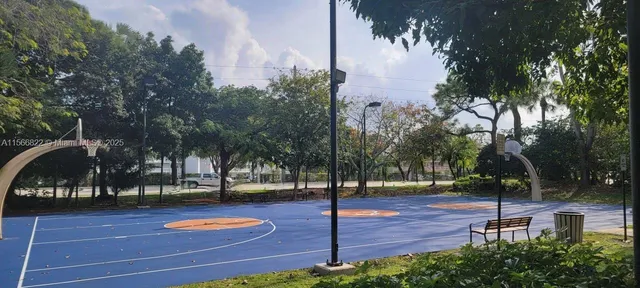 a view of a park with swings