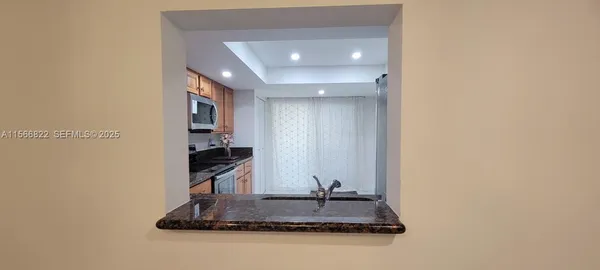 a view of a room with an empty space
