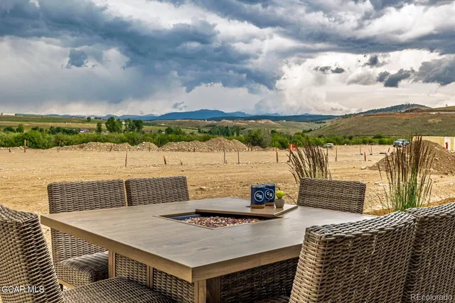 a terrace of a house with outdoor seating