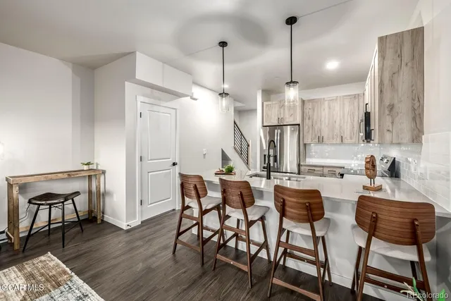 a view of a dining room with furniture