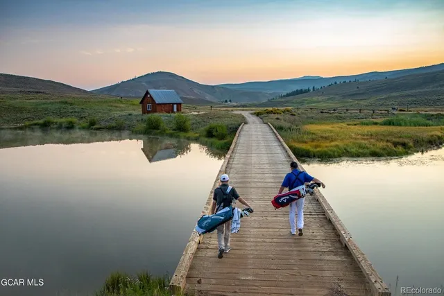 a picture of a bathroom with a sink and mirror