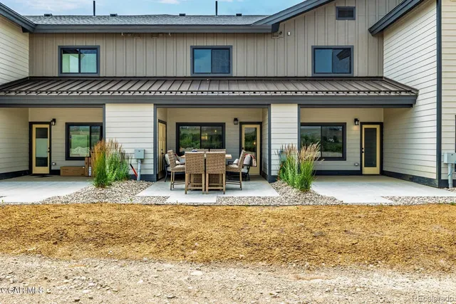 a view of a house with patio