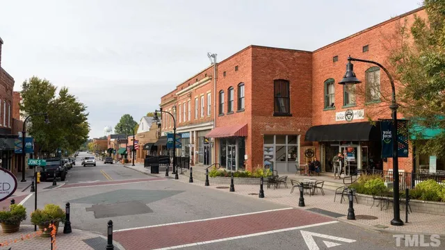 a view of street with sitting area