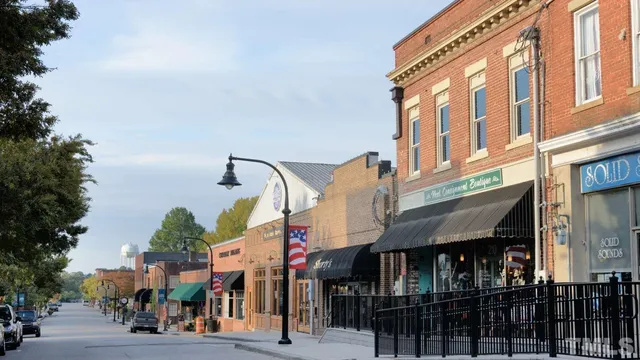 a view of a street with buildings
