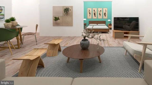 a living room with furniture kitchen view and a table