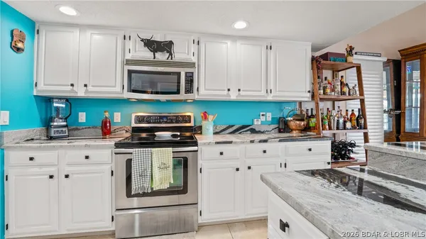 $499,000 | 70 Sunrise Ridge Drive, Unit 3A, Sunrise Beach, MO 65079