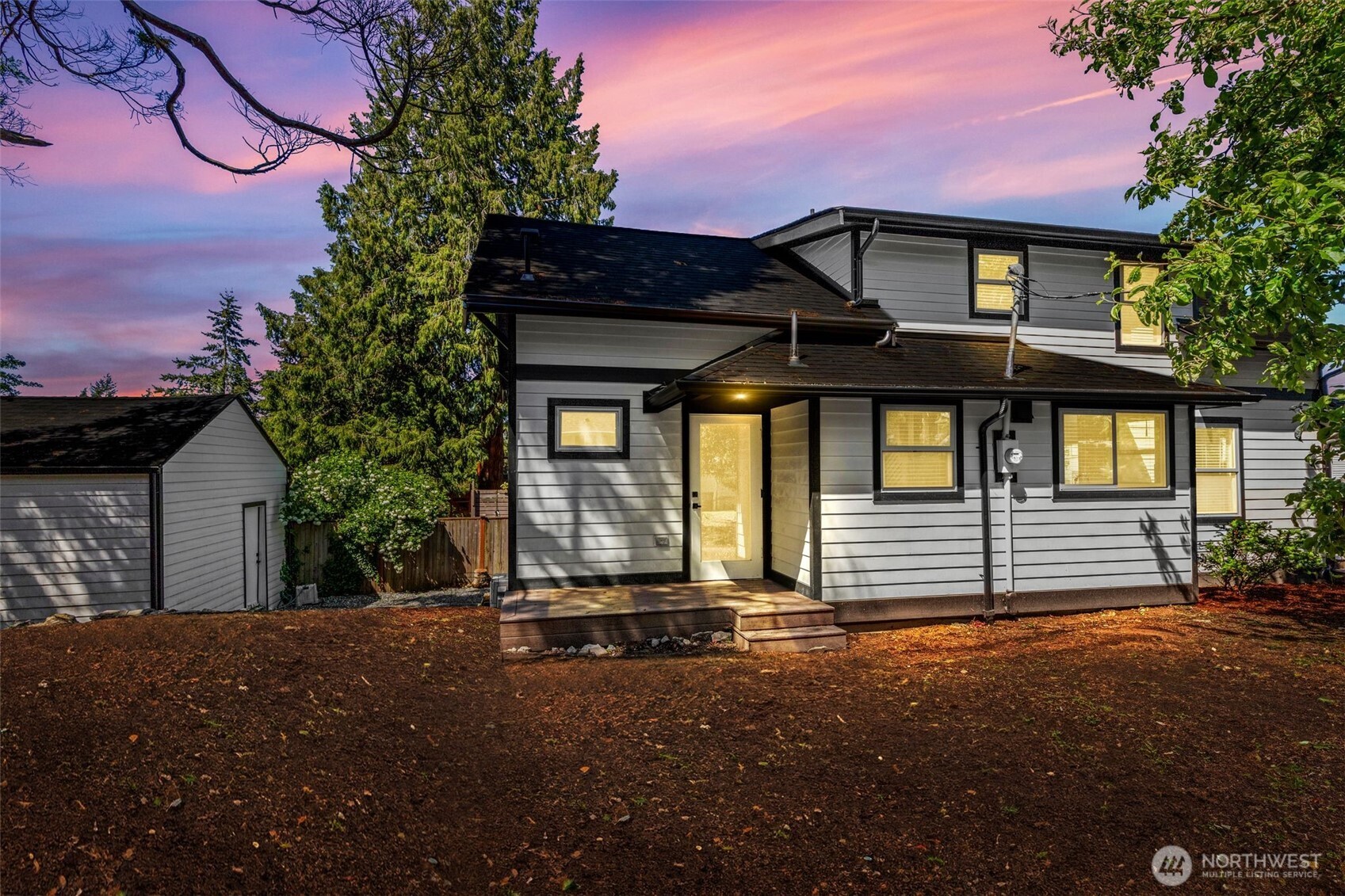 2125 North 90th Street Seattle, WA 98103 - Photo 23 of 29 a front view of a house with a yard