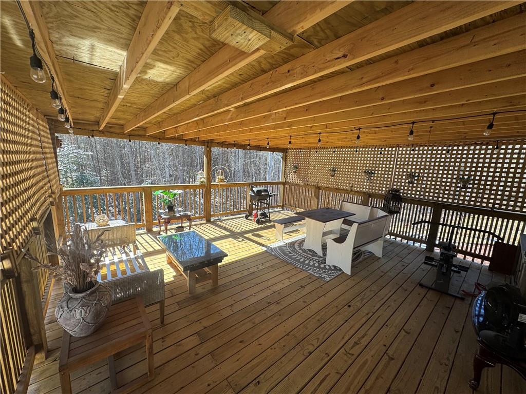 524 Pink Williams Road Dahlonega, GA 30533 - Photo 12 of 39 a view of a patio with a table and chairs