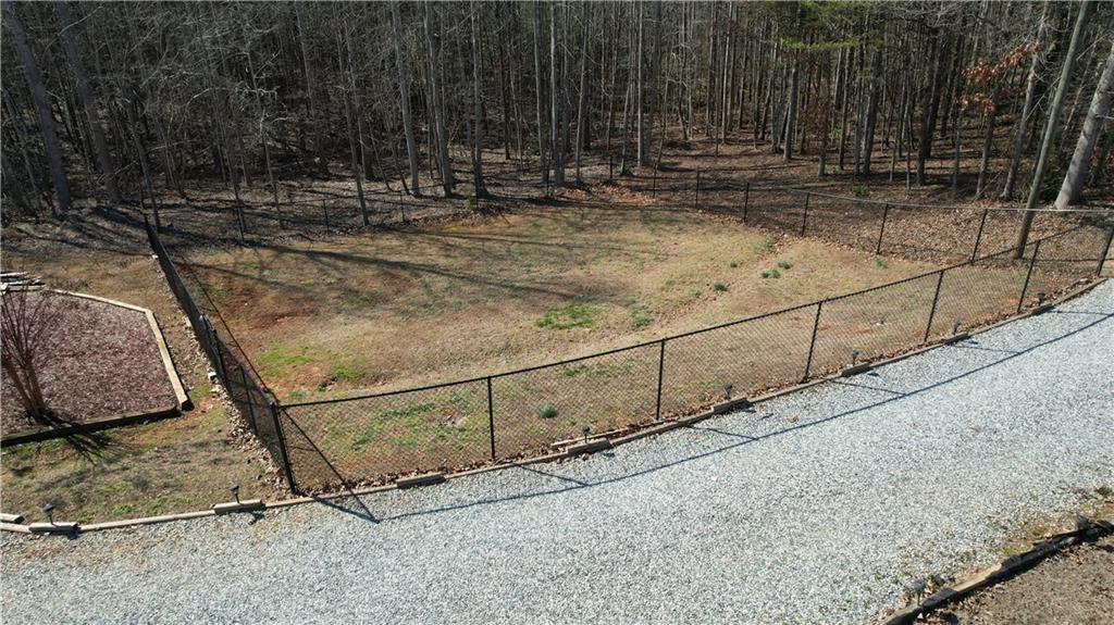 524 Pink Williams Road Dahlonega, GA 30533 - Photo 29 of 39 a view of a backyard with wooden fence