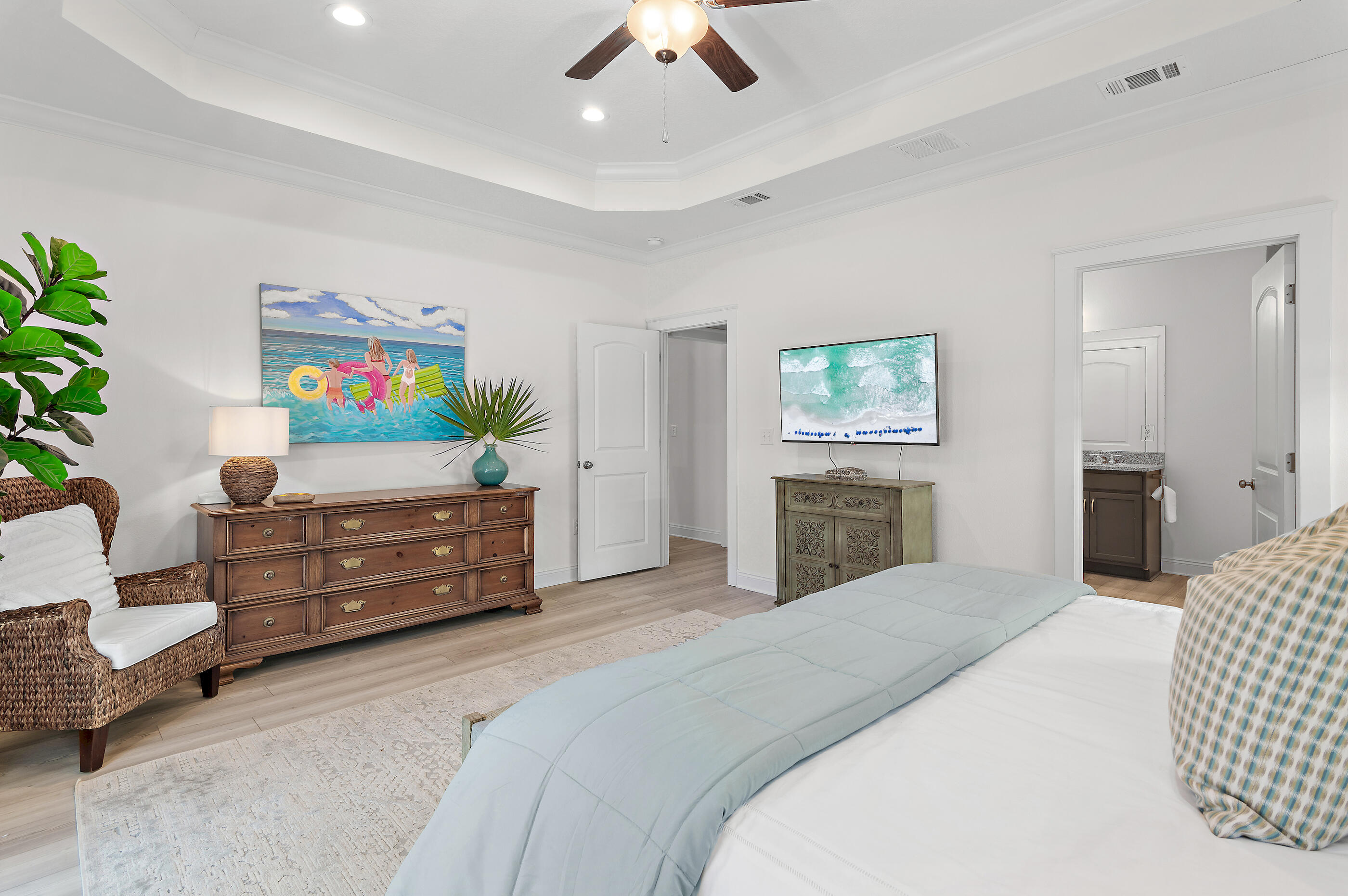 288 Robert Ellis Street Santa Rosa Beach, FL 32459 - Photo 25 of 61 a bedroom with a bed and a chandelier