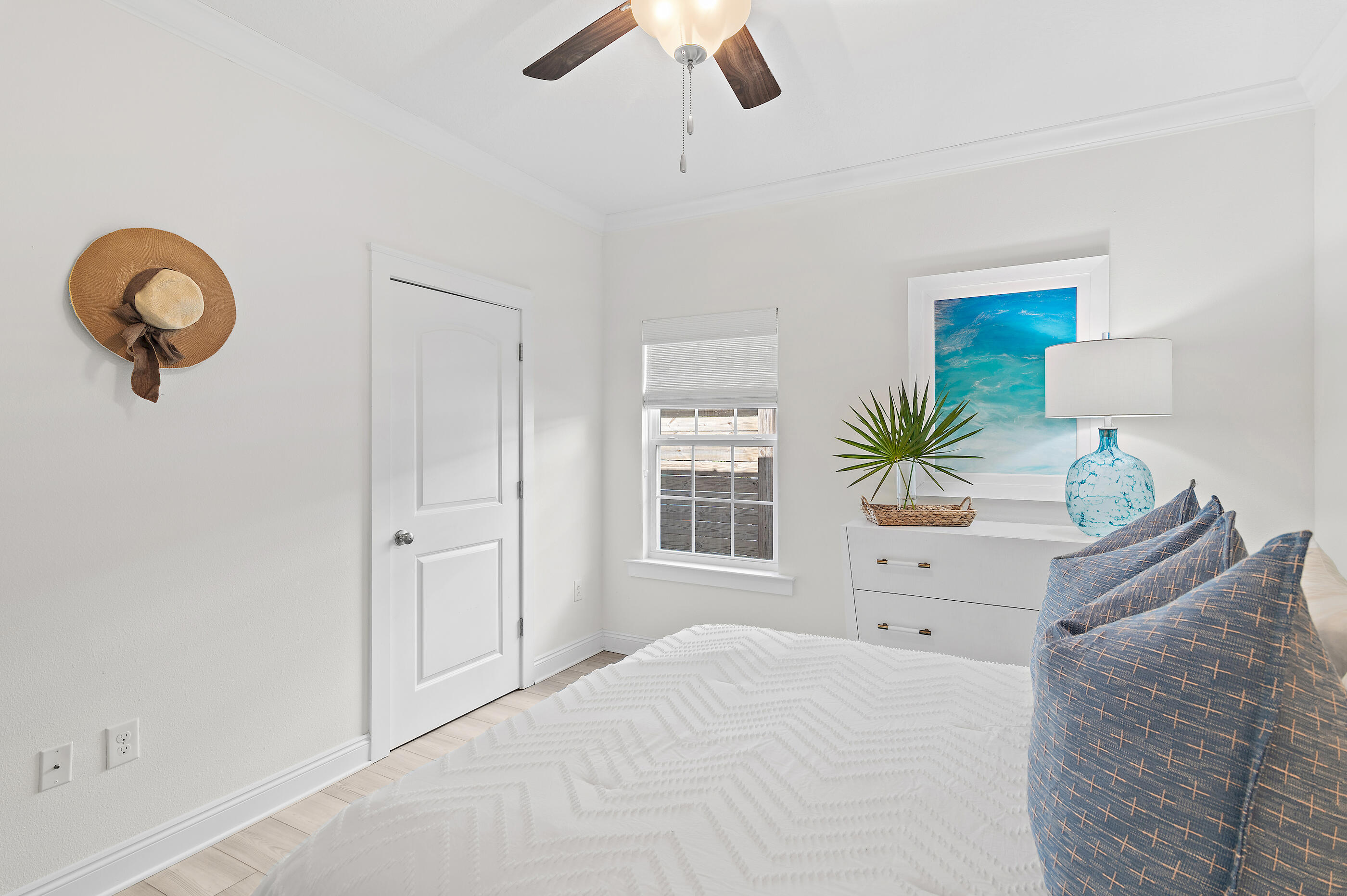 288 Robert Ellis Street Santa Rosa Beach, FL 32459 - Photo 30 of 61 a bed room with a bed and a chandelier