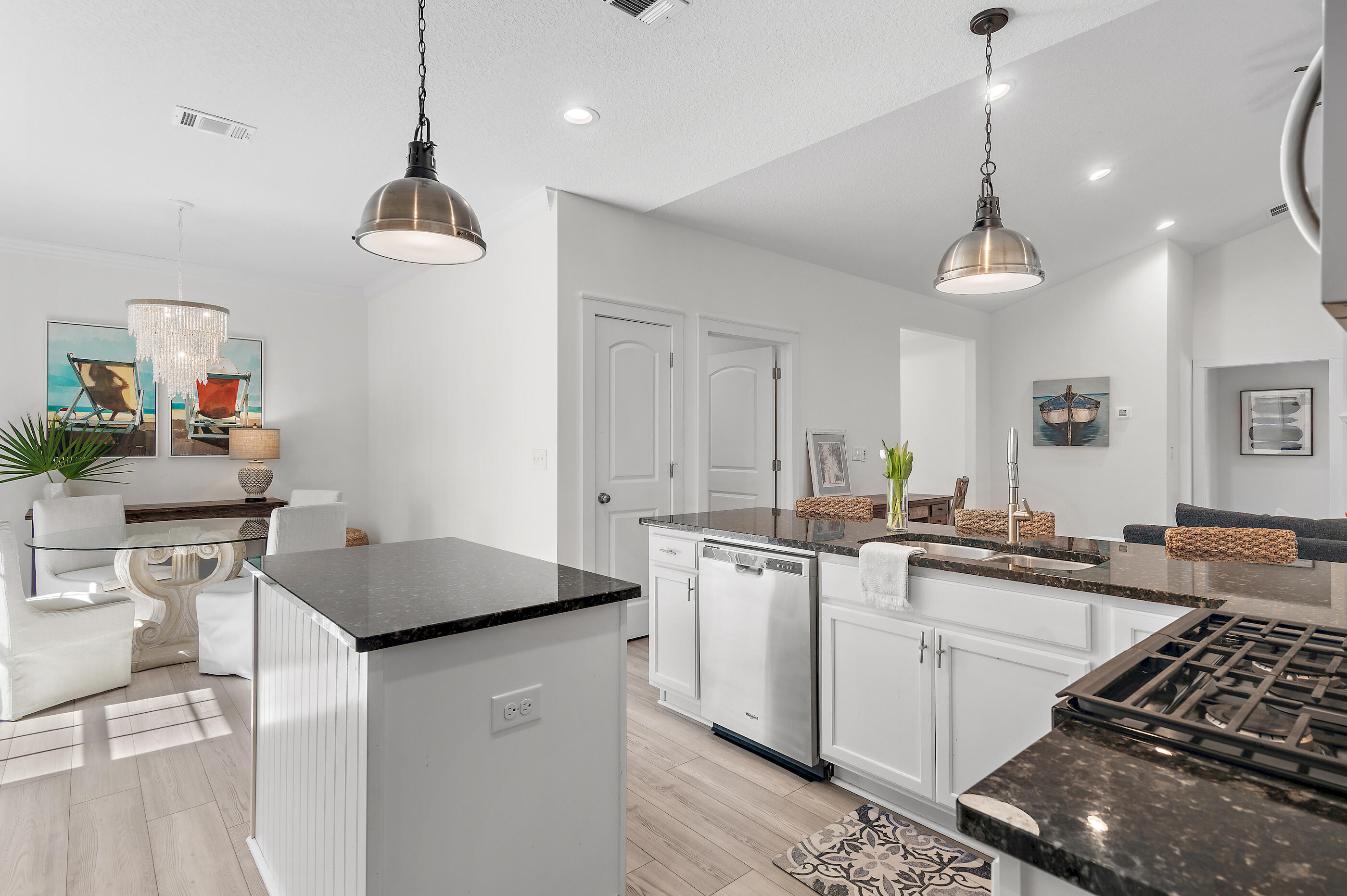 288 Robert Ellis Street Santa Rosa Beach, FL 32459 - Photo 9 of 61 a kitchen with stainless steel appliances granite countertop a sink stove and refrigerator