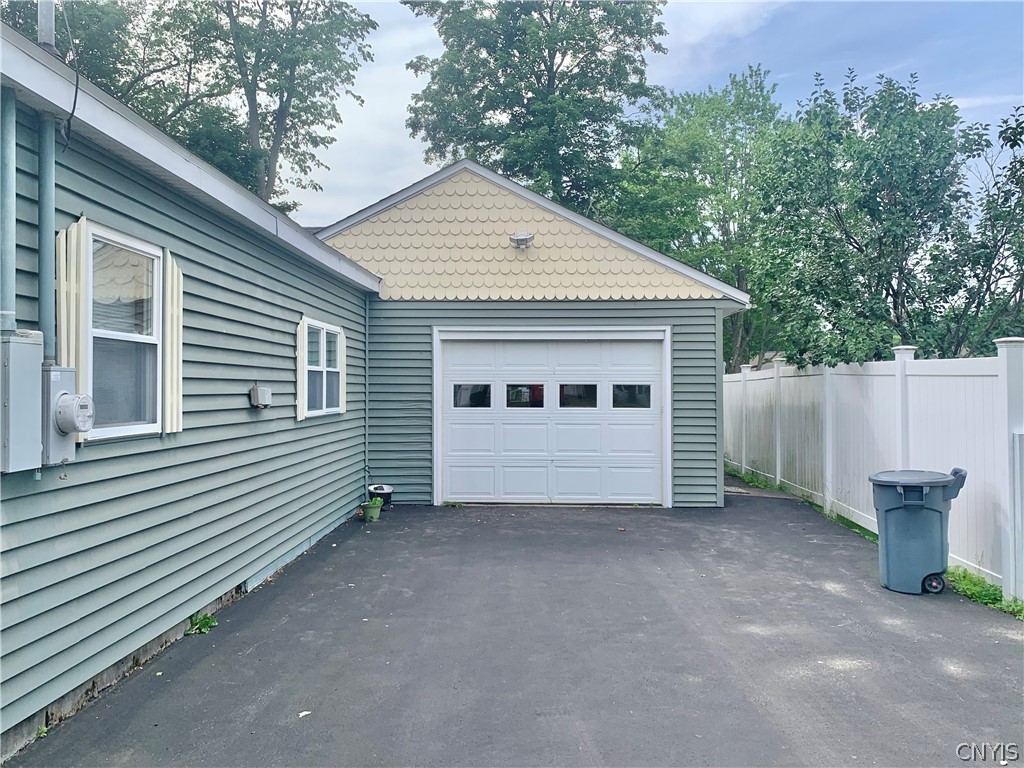 53 Pinecrest Road Whitestown, NY 13492 - Photo 2 of 33 One car attached garage with drive through overhea