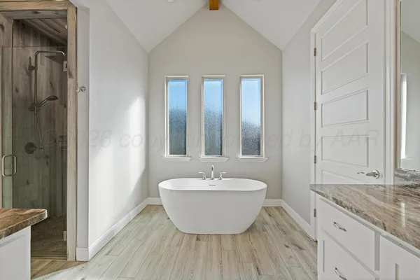 a view of a bathroom with shower