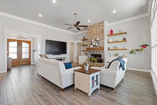 a large white kitchen with lots of counter space